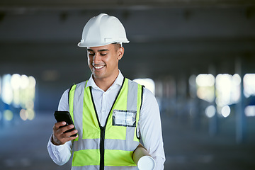 Image showing Architecture, phone and happy man with blueprint, reading email or social media at construction site in communication. Engineer with cellphone, typing message with safety and planning with smile.