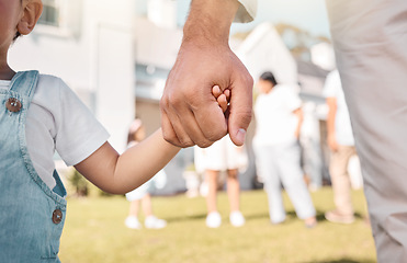 Image showing Closeup, parent or child holding hands in new home or real estate as family bonding with love or care. Support, embrace or guardian with a young kid with affection moving in to house property grass