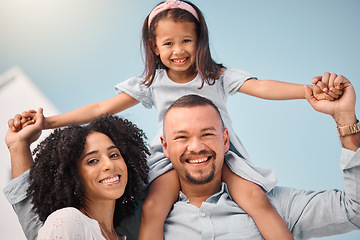 Image showing Family in portrait, girl on man shoulders and happy people outdoor, mother and father with young daughter bonding. Parents, female kid and smile, happiness and care, love and quality time together