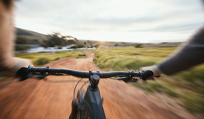 Image showing Sports, cycling and person pov on a bike in nature for fitness, training and morning cardio routine. Bicycle, exercise and cyclist riding in countryside with freedom performance or speed challenge