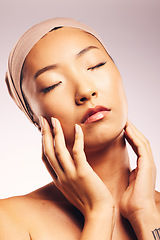 Image showing Skincare, dermatology and Asian woman with cosmetics, natural beauty and grooming against a white studio background. Female person, girl and model with treatment, glow and shine with luxury and spa