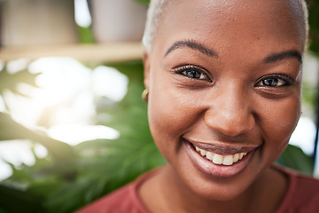 Image showing Portrait, plants and smile with a black woman gardener in her home for sustainability or green growth. Face, beauty and flare with a happy young female person in a nursery for eco friendly gardening