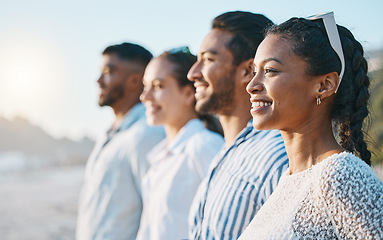 Image showing Happy, line and friends at the beach for sunset together for bonding, vacation or freedom. Smile, community and people in a row at the ocean during vacation for fun, weekend or summer in Bali