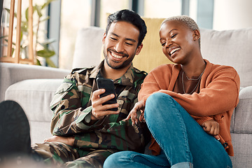 Image showing Army man, interracial couple and return with phone meme at home with laugh and video streaming. Lounge, young people and mobile scroll together in a house sitting on a lounge ground with soldier