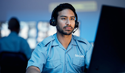 Image showing Security guard, monitor and worker man watching screen relax on the job for building protection. Surveillance, safety application and live streaming watch of a employee checking the system for danger