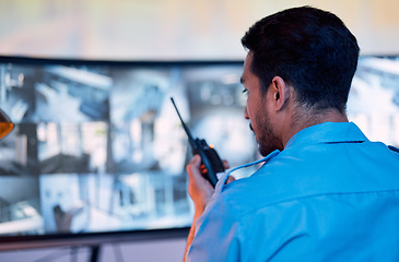 Image showing Security guard, radio and cctv screen, communication and inspection service for building safety. Monitor, video surveillance agency and law officer in control room talking on safe intercom system.