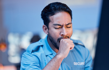 Image showing Security officer, man and tired at work with uniform or late night working for career in protection. Exhausted, safety professional and guard with yawn or guy during shift at desk with burnout.