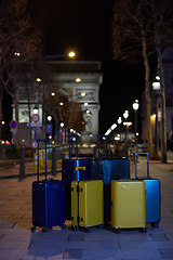 Image showing Luggage consisting of six polycarbonate suitcases standing on the street