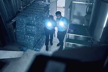 Image showing Security, emergency and police investigation or search a crime in a store at night or in the evening for protection. Teamwork, job and professional safety employees search a room for criminal danger