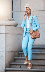 Image showing Phone call, happy and businesswoman on stairs in the city walking from her office building. Smile, briefcase and professional African female lawyer on mobile conversation with cellphone in urban town