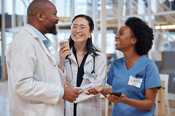 Image showing Women, black man and doctors in a meeting, planning and discussion with happiness, hospital and teamwork. Male person, staff and medical professional with conversation, healthcare and collaboration