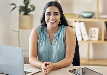 Image showing Technology, portrait of a happy businesswoman and laptop at her desk in a modern workplace office. Internet or digital connectivity, administration or research and cheerful female seo manager