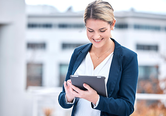 Image showing Happy, business and a woman with a tablet in the city for communication, email or typing on the web. Smile, chat and a corporate employee with tech for a work app, social media or reading information