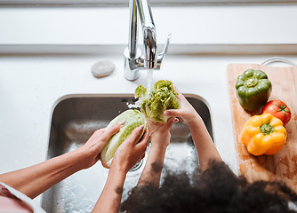 Image showing Hands, kid and parent by sink, vegetables or above for cleaning, faucet or water for teaching, cooking or home. Person, child and ready for preparation, start or helping hand with nutrition in family