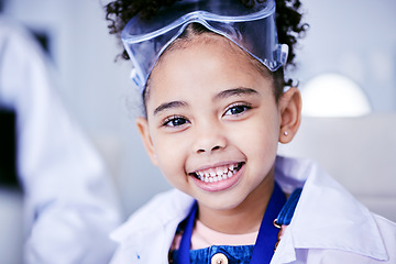 Image showing Child, laboratory and medical science portrait of a girl with a smile while happy. Face of African kid student excited for future scientist, education or learning biology experiment in a class