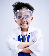 Image showing Child, portrait and happy scientist girl in studio with arms crossed, glasses and a smile. Face of a African kid student excited for medical science, education or biology experiment for future career