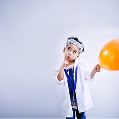 Image showing Child, thinking and balloon science in studio with .hand on chin, goggles and idea. African kid student with solution or problem solving, education or fun biology experiment on a white background