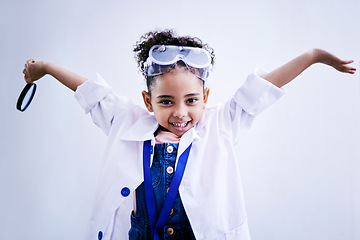 Image showing Child, happy and portrait of a scientist girl in studio with open hands, glasses and a magnifier. Face of a African kid student excited for medical science, education or biology experiment for future