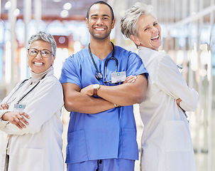 Image showing Collaboration, doctor and healthcare with crossed arms in portrait at hospital, smile and laugh for leadership. Medical professional, teamwork and happy group at clinic for service, positive mindset.