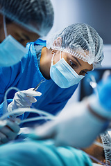 Image showing Medical tools, theatre and doctors or woman for hospital support, teamwork and emergency healthcare with focus. Surgery, nurses and surgeon in face mask, patient check and tweezer in operating room