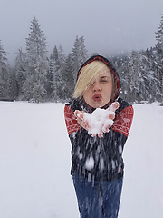 Image showing Happy winter time. Well dressed enjoying the winter