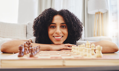 Image showing Chess, game and portrait of woman with board for strategy, thinking and challenge at home. Competition, winning and female person with chessboard in living room ready for playing and problem solving