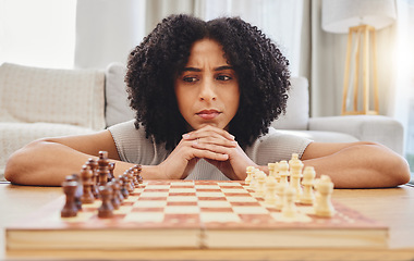 Image showing Chess, thinking and face of woman with game for strategy, problem solving and challenge at home. Competition, planning move and female person with chessboard in living room ready for playing games