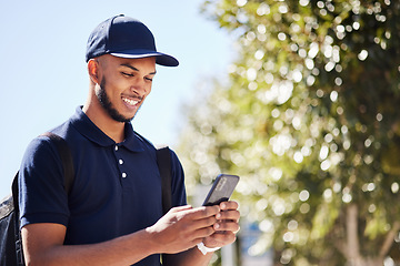 Image showing Technology, man with smartphone and in city streets for connectivity. Online communication or social media, texting networking or happy and male person with cellphone for conversation outdoors