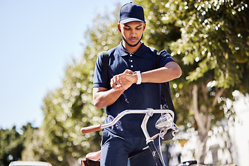 Image showing Bicycle, delivery and man checking watch in city, bike transport service and digital app for logistics. Time management, cycling and online schedule with mobile application for courier driver on road