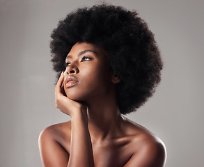 Image showing Skin, face and natural beauty, black woman thinking, cosmetics and glow isolated on studio background. Skincare, dermatology and facial treatment, African model with makeup and ideas with shine