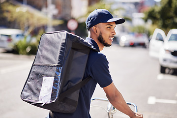 Image showing Man, bicycle and delivery in city with bag of logistics, distribution service and fast food order. Courier, eco friendly transport or deliveryman travel on bike with ecommerce product in urban street