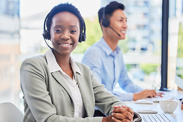 Image showing Black woman, telemarketing and smile at help desk for communication, customer support or contact in coworking call center for CRM. Happy female agent consulting for sales, telecom or advice in office