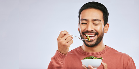 Image showing Fruit, healthy food and happy asian man in studio for health, wellness or detox on grey background. Breakfast, salad and face of guy nutritionist smile for clean, green or raw diet or vegan lifestyle