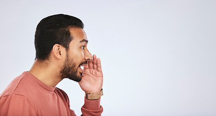 Image showing Hand, secret and asian man in studio with whisper sign for announcement, promo or news on grey background. Confidential, gossip and male with drama, rumor or coming soon, emoji and did you know sale