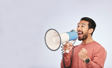 Image showing Megaphone, man and shout in studio space, white background and broadcast speech, announcement and mockup. Asian model, microphone and advertising sales, news and attention of deal, promotion or offer