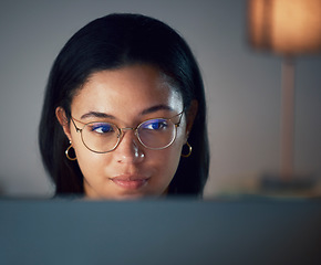 Image showing Glasses, focus and woman journalist writing on a computer, online and social media news update or a serious blog. Face, internet and remote work for an employee working on a project or proposal