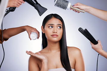 Image showing Beauty, choice and woman in studio for makeover, grooming and treatment on grey background space. Haircare, decision and hands of styling team with female wellness model for glamour keratin results