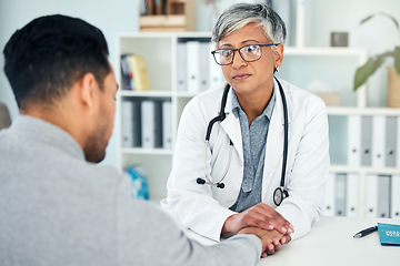 Image showing Empathy, sad and holding hands with doctor and patient in hospital for consulting, medical and cancer. Healthcare, medicine and depression with woman and man in clinic for support, news and pain