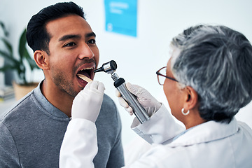 Image showing Healthcare, consulting and doctor with person and throat in hospital for cancer, sick and surgery. Medicine, medical and check up with woman and patient in clinic for wellness, virus and mouth exam