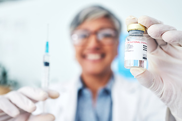 Image showing Hands, vaccine and woman doctor in hospital with medical, innovation or cure for smallpox in closeup. Vaccination, vial and health expert with syringe for healthcare, injection or covid treatment