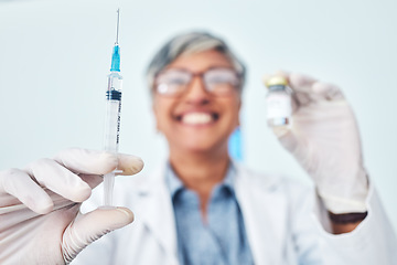 Image showing Vaccine, hands and woman doctor in hospital with medical, innovation or cure on blurred background. Vaccination, vial and lady health expert with syringe for healthcare, injection or covid treatment