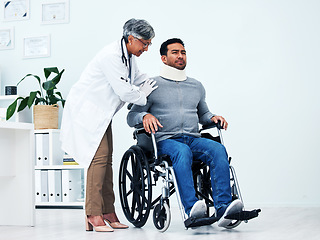 Image showing Hospital, injury and doctor with man in wheelchair for medical emergency, accident and surgery. Healthcare, clinic and health worker with patient with disability for help, support and rehabilitation