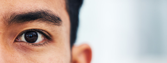 Image showing Half portrait, closeup and eyes of man with mockup for vision, focus and healthcare with test for contact lenses. Zoom, eye exam banner and model looking at healthy lens care and wellness on space