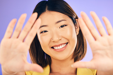 Image showing High five, hands and portrait of woman with support, care or gesture for motivation, success and happiness in studio. Palm, hand or face of Asian model with smile for team building or positive person