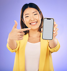 Image showing Phone screen, portrait and woman with mockup presentation, marketing and social media information. Happy asian person with mobile space for contact and ui or ux design on studio, purple background