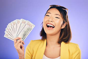 Image showing Money fan, portrait and woman or winner with bonus, financial success and winning, college loan or lottery. Happy asian person or student with scholarship cash or funding on studio, purple background