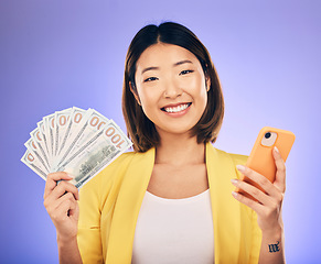 Image showing Money, phone and woman in portrait winning, finance or online savings, profit and cash prize. Success, lottery and winner or asian person on mobile, money fan and banking on studio, purple background