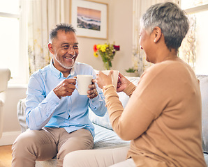 Image showing Coffee, smile and a senior couple on a sofa in the home living room to relax while bonding in conversation. Love, retirement or marriage with a mature man and woman talking while drinking a beverage