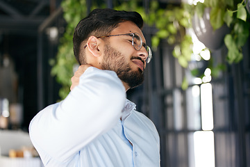 Image showing Business man, neck pain and problem with health issue and muscle fatigue in a office. Employee, young male person and professional and injury of worker feeling tired from inflammation at work