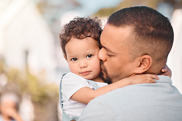 Image showing Love, dad and child hug, kiss and family bonding, support and trust in safety of parents embrace. Security, future hope and father with baby outside, hugging and spending safe quality time together.